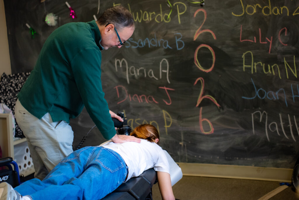 Dr. Deitch providing chiropractic care and spinal adjustment services at Deitch Chiropractic in Princeton Junction, New Jersey helping patients with back and neck pain.